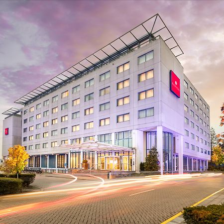 Отель Ramada By Wyndham Amsterdam Airport Schiphol Бадхоеведорп Экстерьер фото